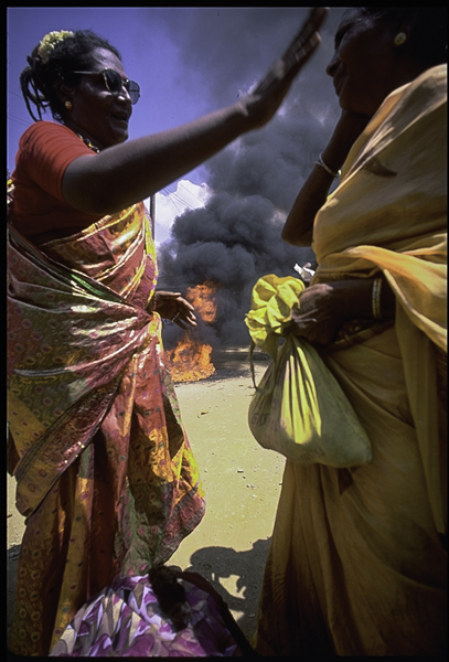 Guru blessing devotee near the Aravani Temple Koovagam, Tamil Nadu